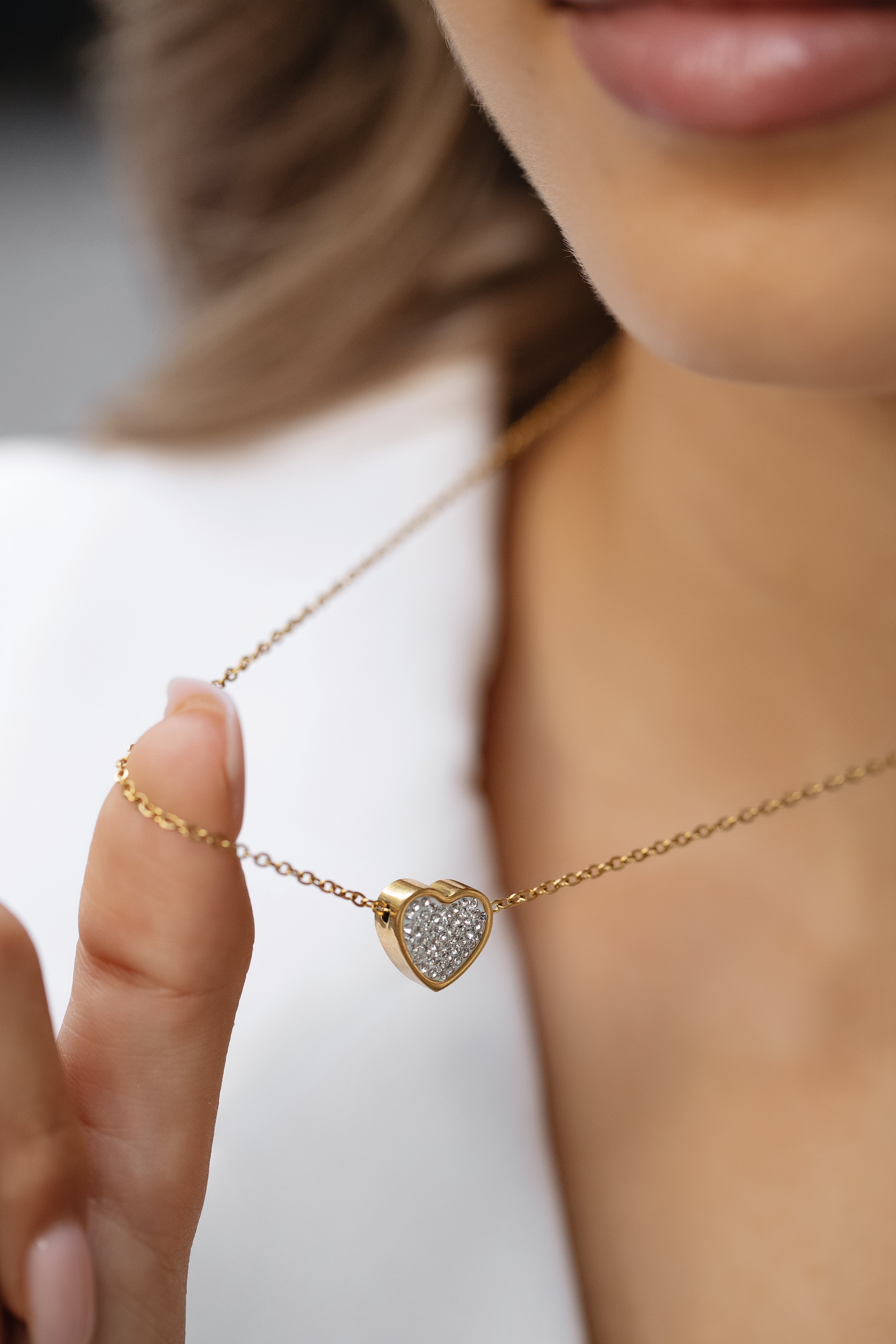 Colier cu diamant și inimă