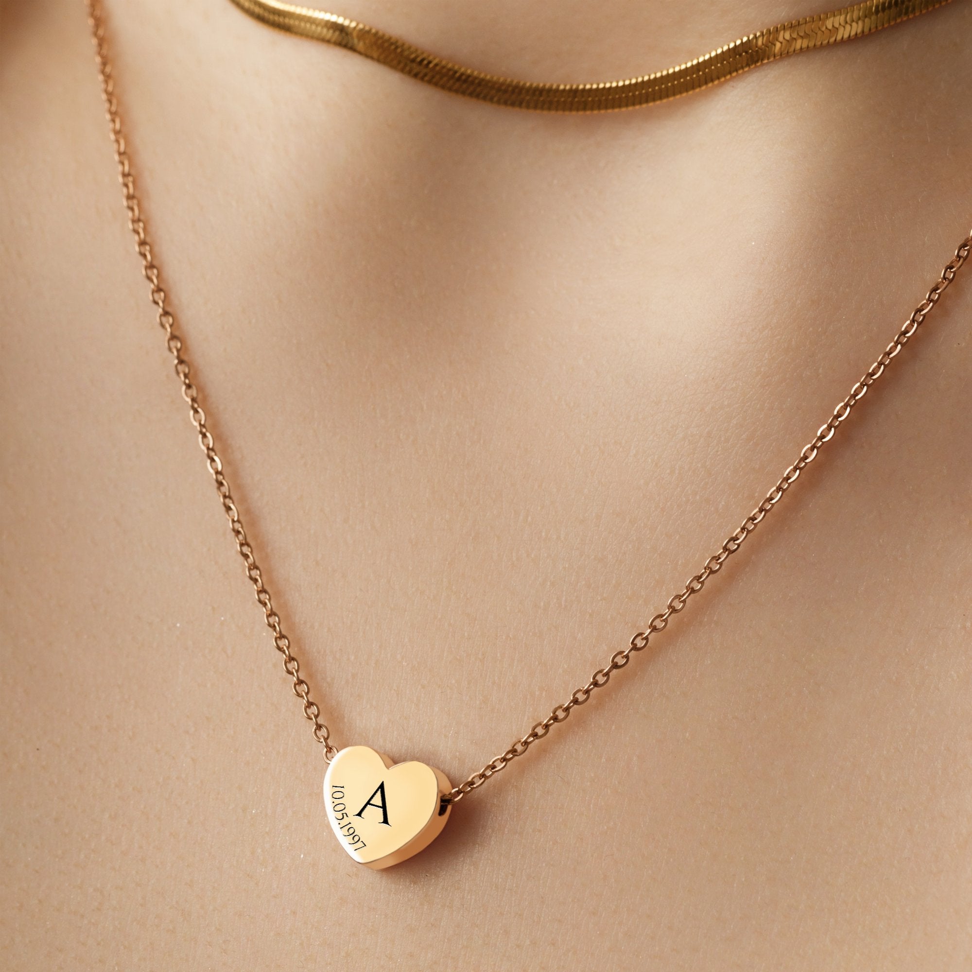 Colier cu diamant și inimă